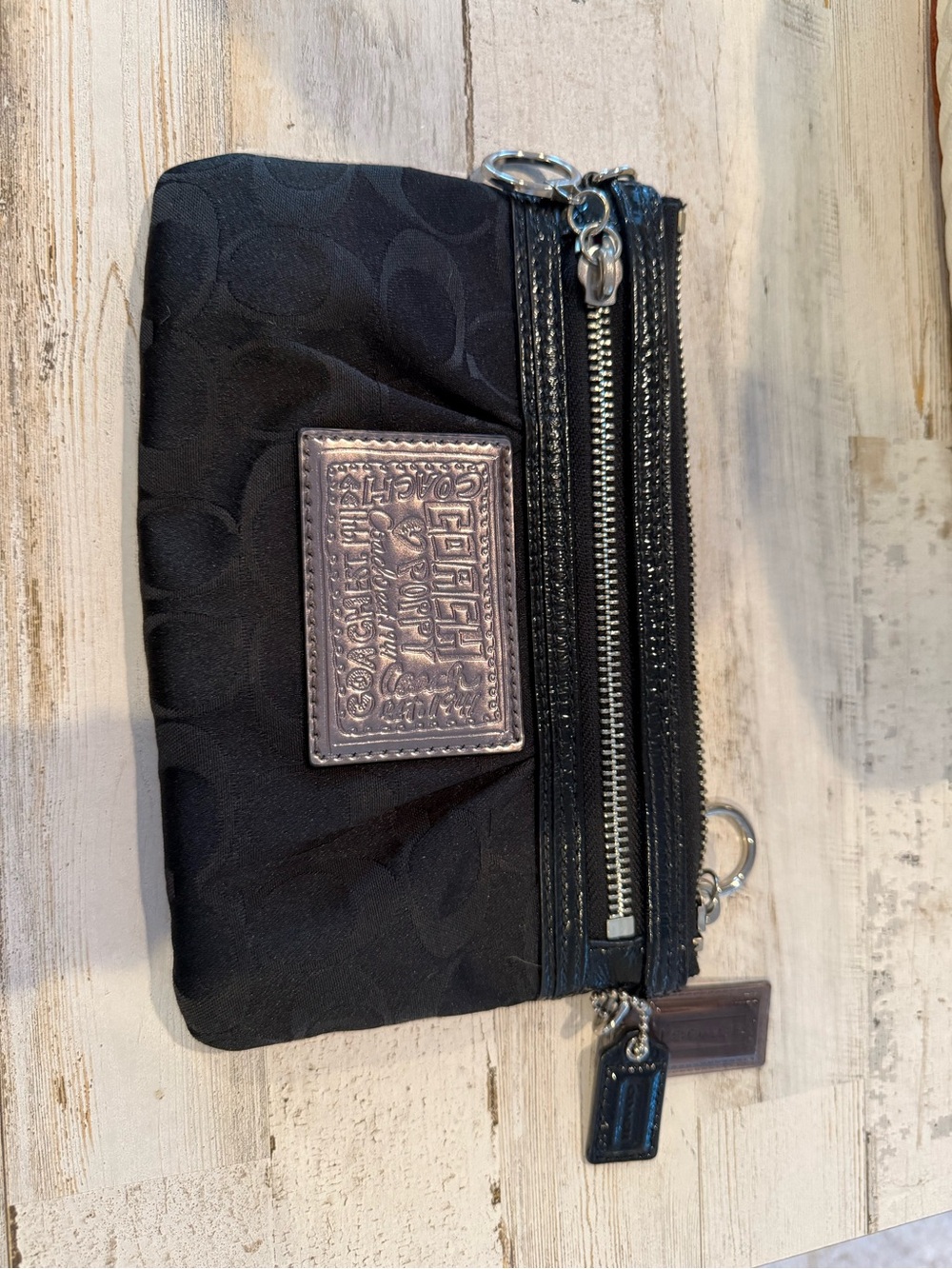 Coach Black Signature Zip Wristlet with Silver Plaque